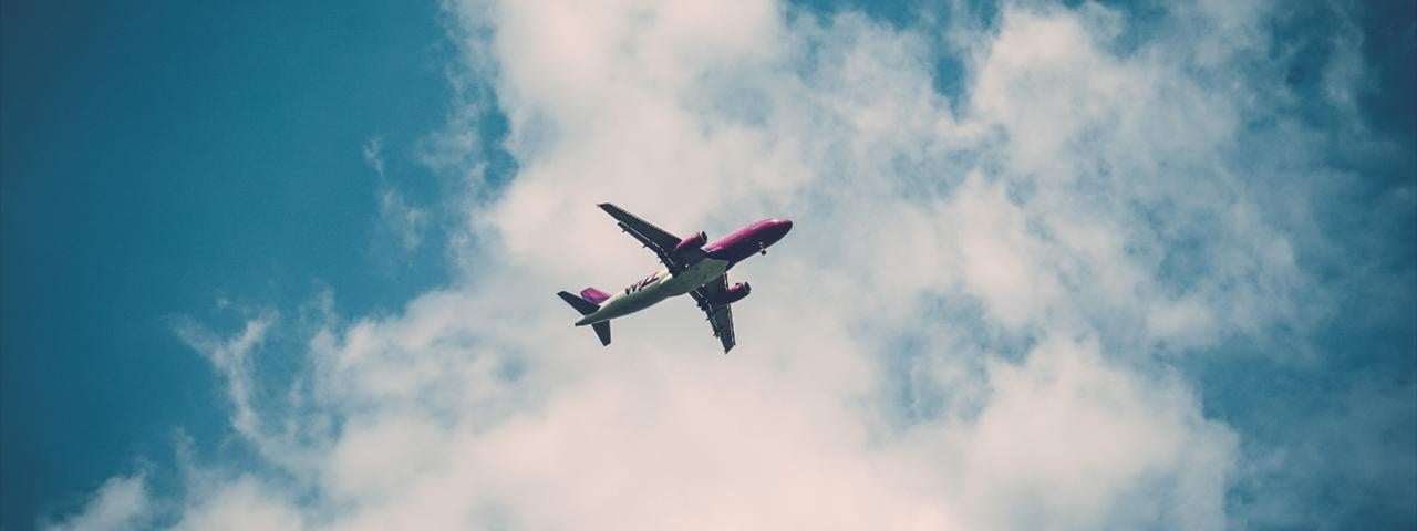 Plane flying through the sky